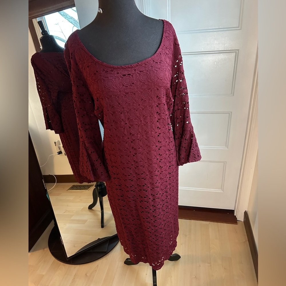 Deep red dress with bell sleeves